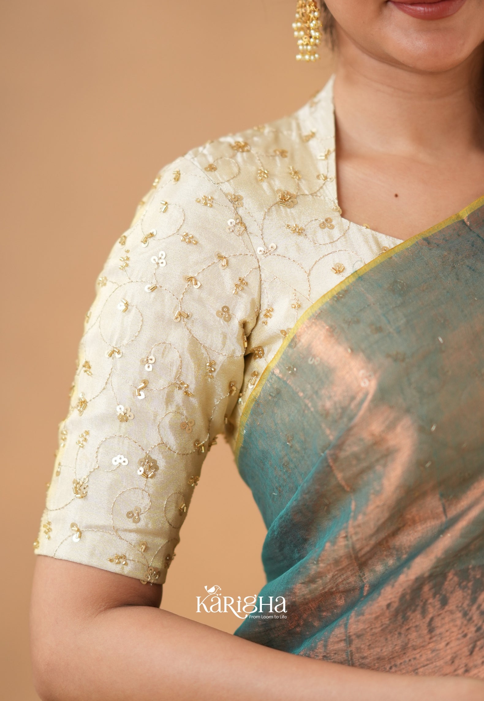 Pearl Petal – Tissue Saree with Delicate Bead Accents