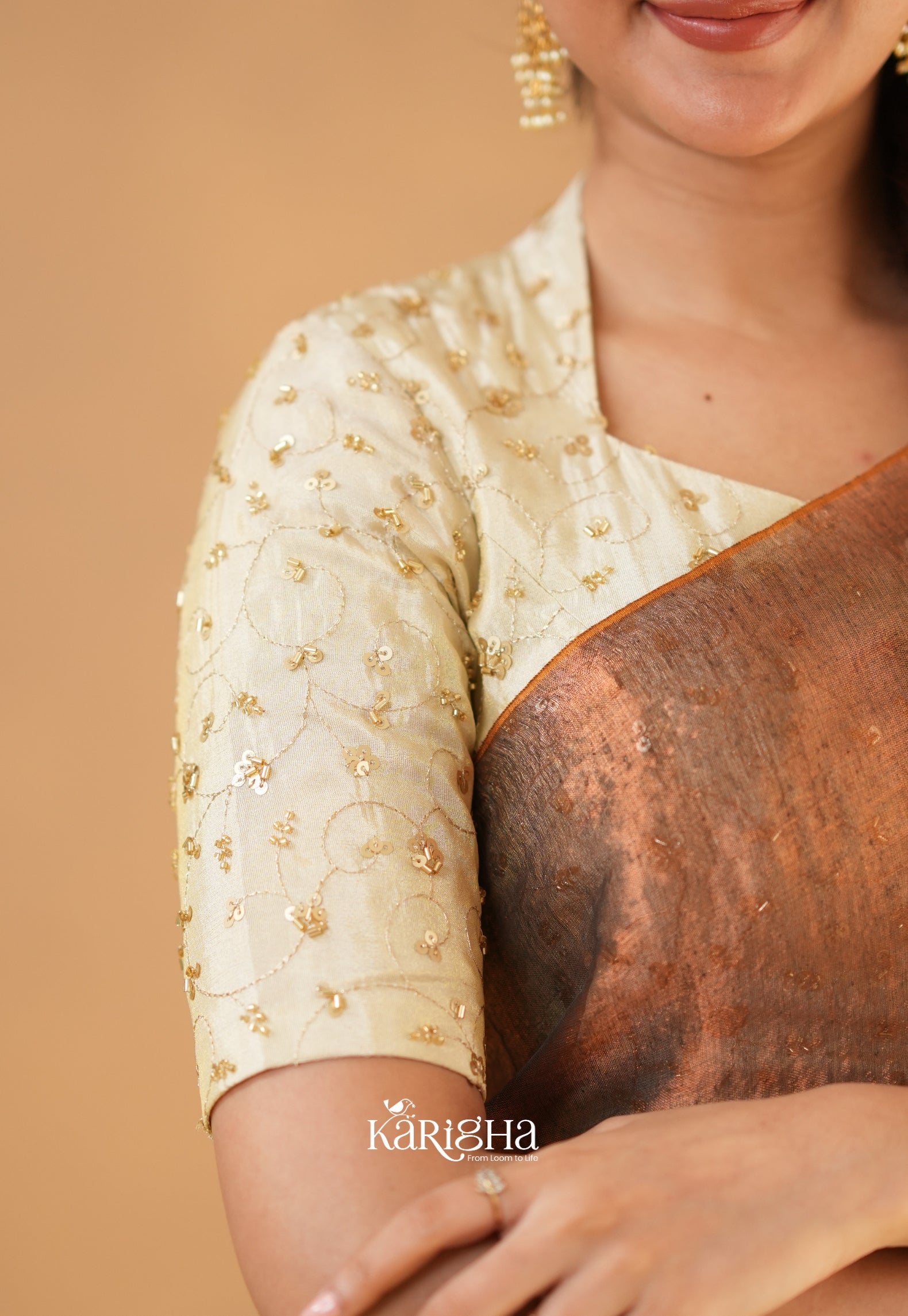 Pearl Petal – Tissue Saree with Delicate Bead Accents