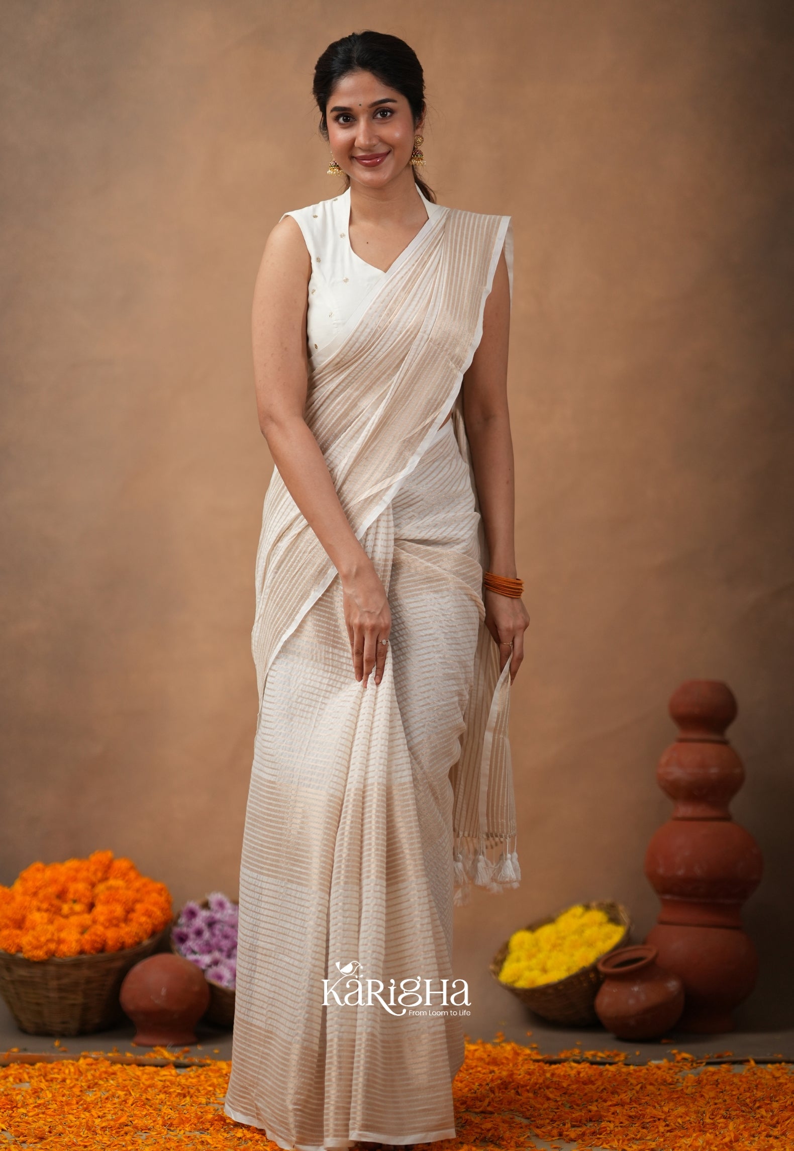 Featherloom Grace – Soft Mul Cotton Saree with Delicate Texture