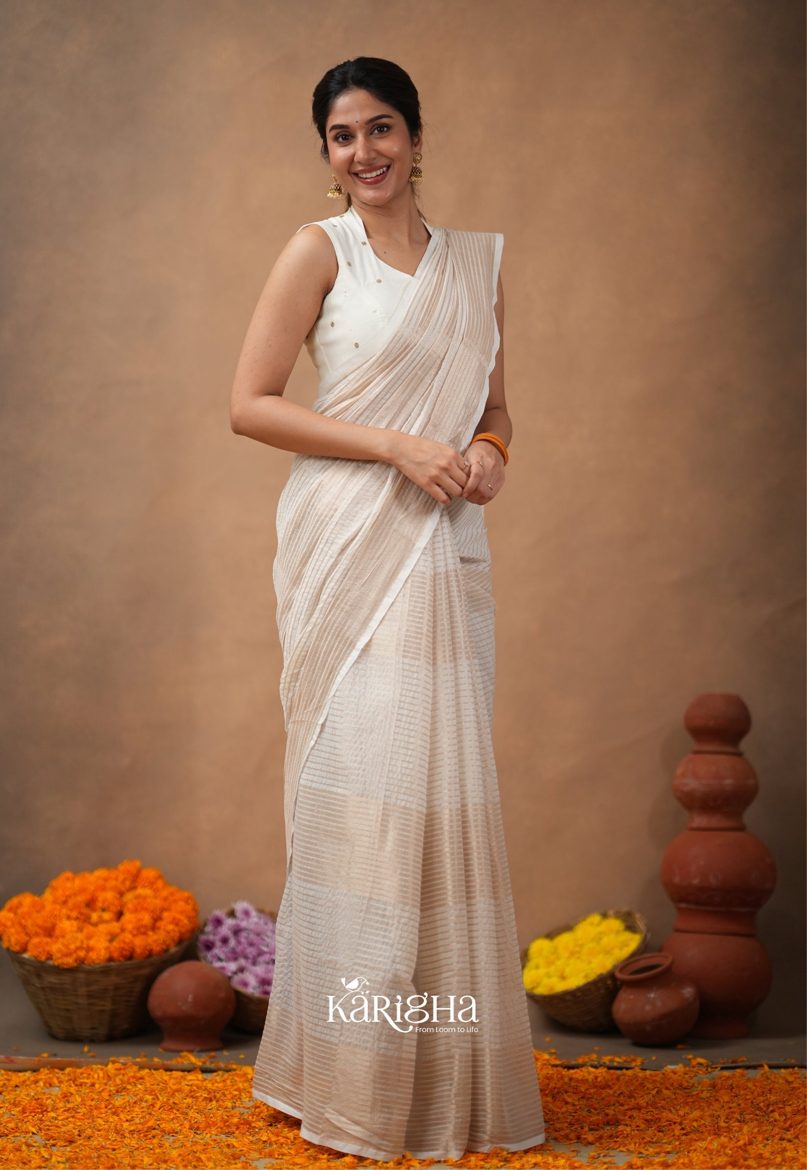 Featherloom Grace – Soft Mul Cotton Saree with Delicate Texture