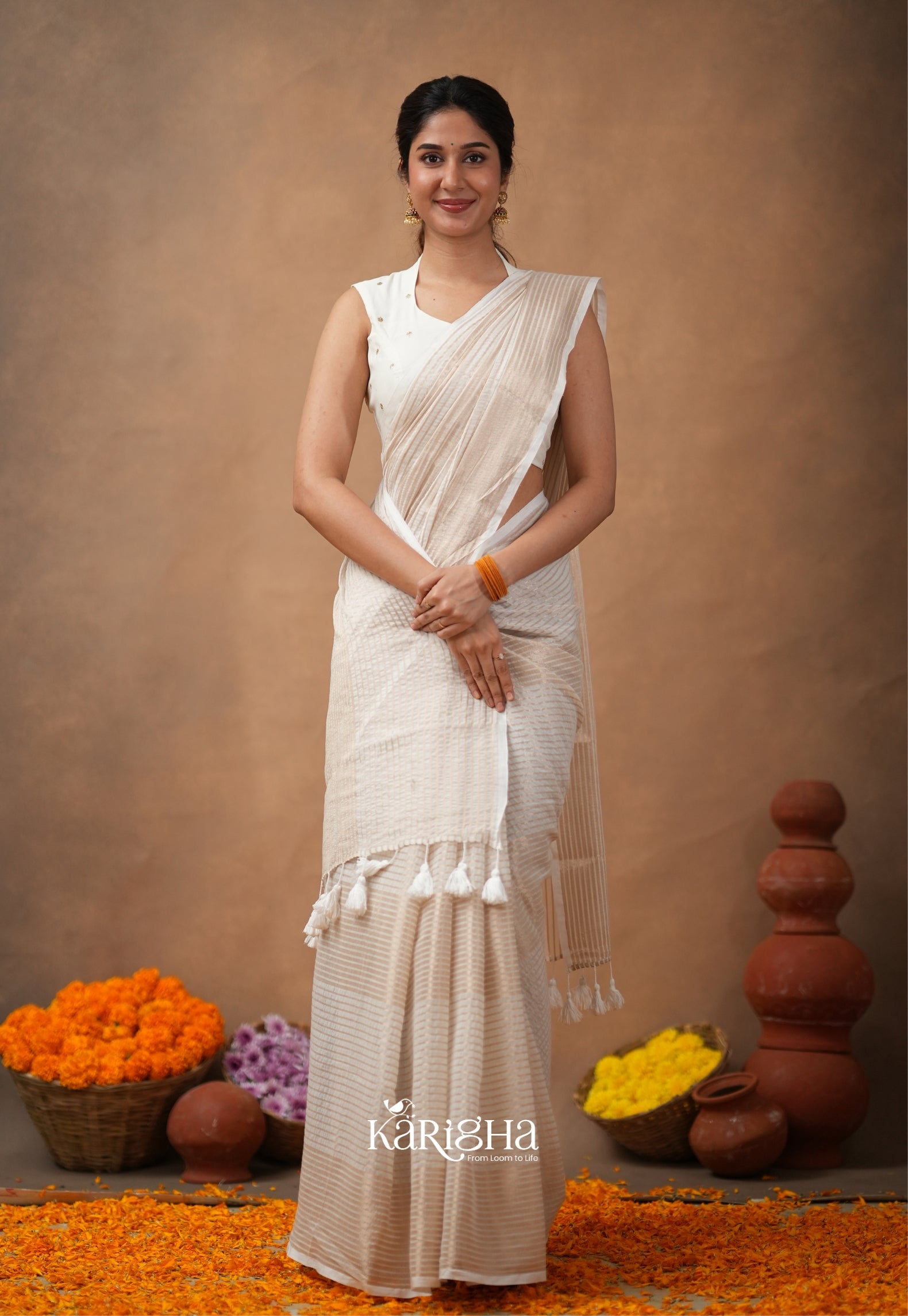 Featherloom Grace – Soft Mul Cotton Saree with Delicate Texture