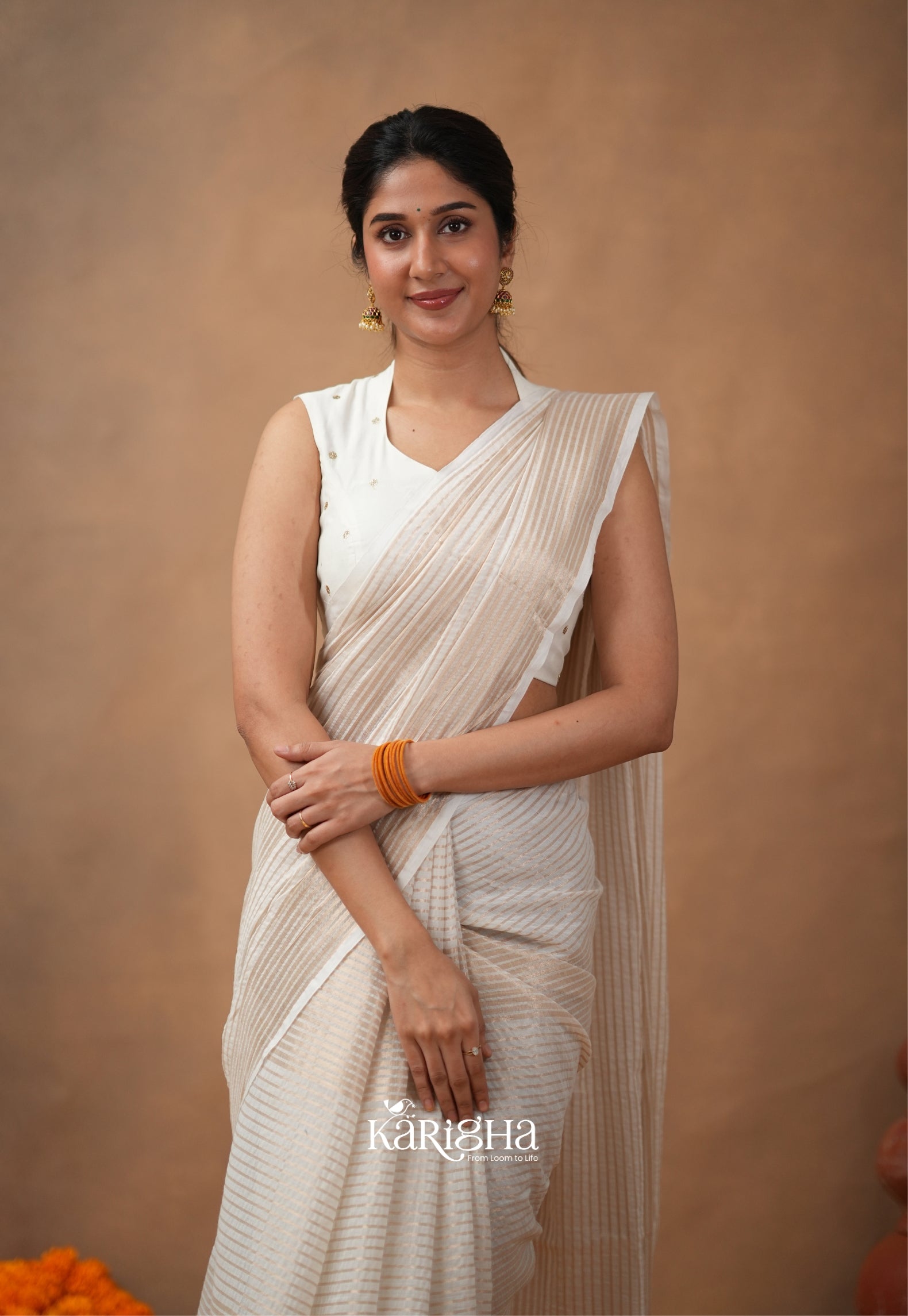 Featherloom Grace – Soft Mul Cotton Saree with Delicate Texture