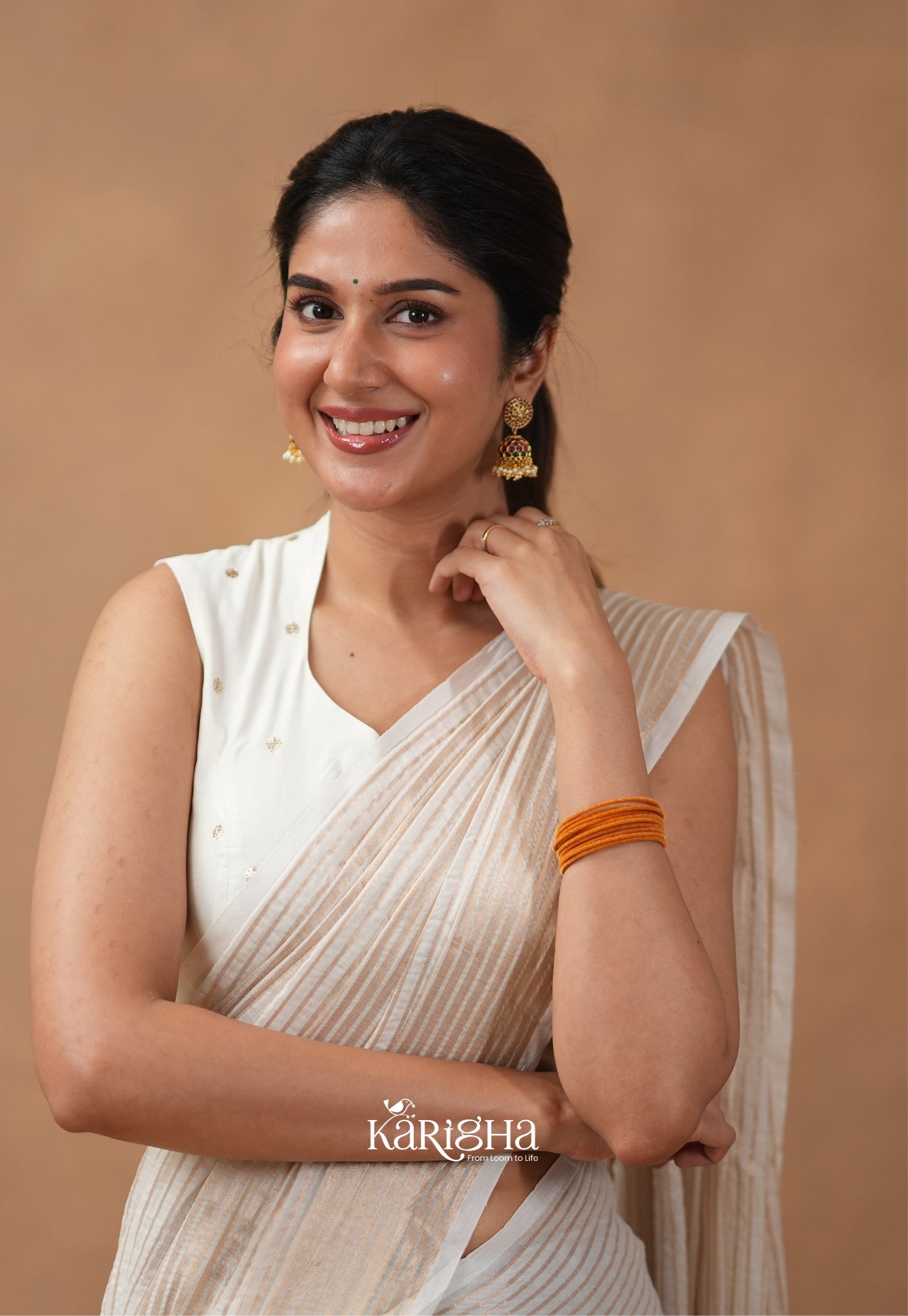 Featherloom Grace – Soft Mul Cotton Saree with Delicate Texture
