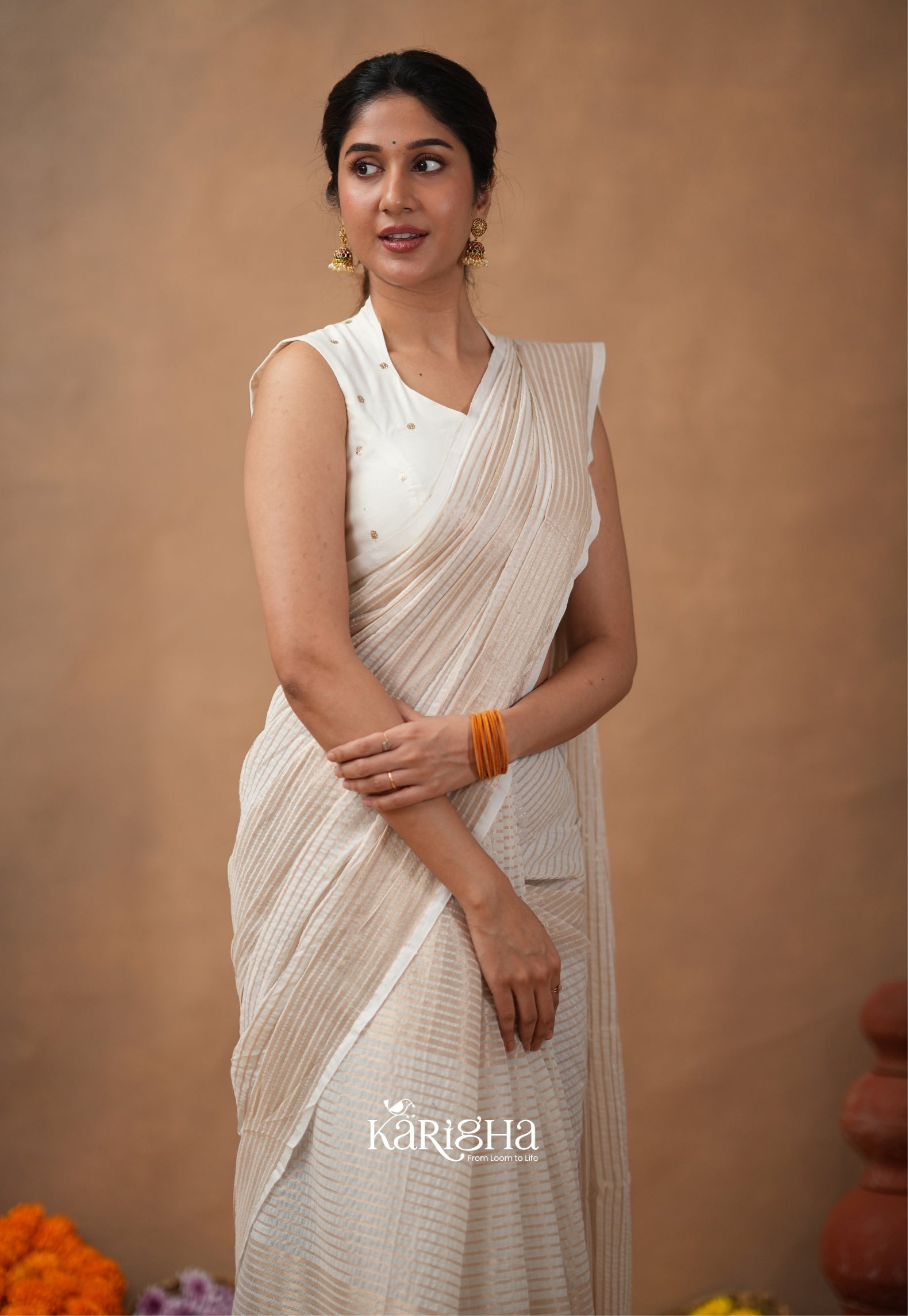 Featherloom Grace – Soft Mul Cotton Saree with Delicate Texture