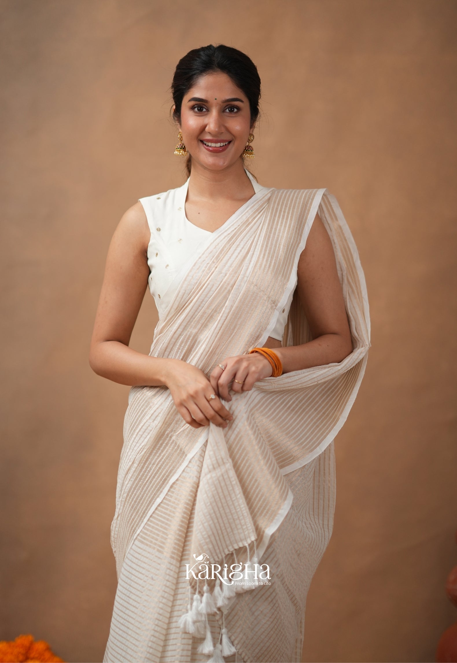 Featherloom Grace – Soft Mul Cotton Saree with Delicate Texture