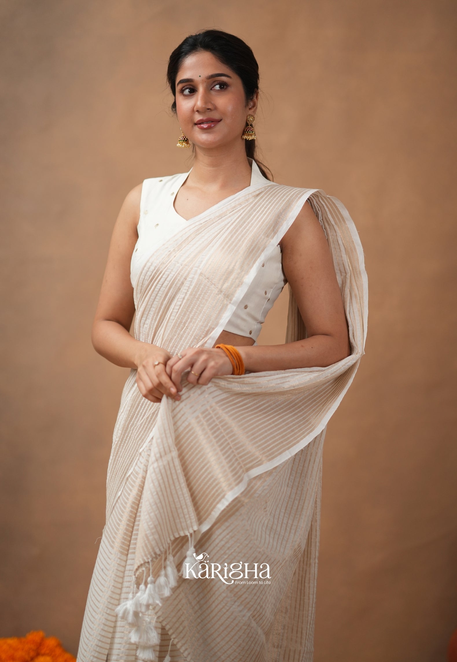 Featherloom Grace – Soft Mul Cotton Saree with Delicate Texture