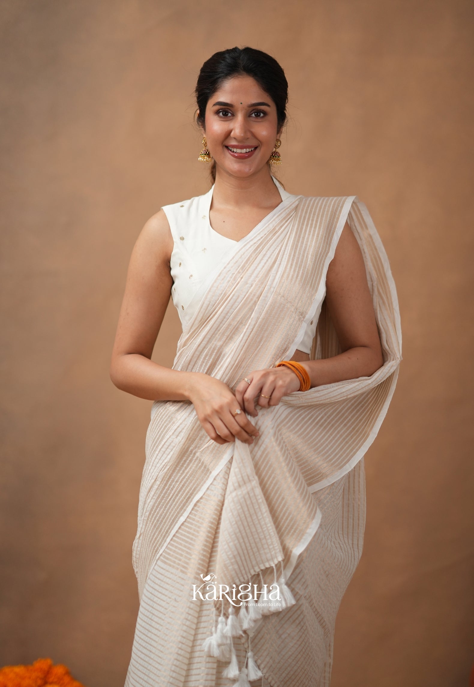 Featherloom Grace – Soft Mul Cotton Saree with Delicate Texture
